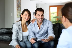Couple meeting consultant for financial contract