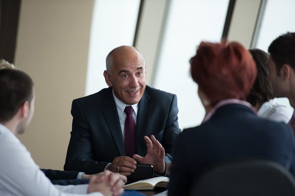 startup business people group have meeting in modern bright office interior, senoir investors and young software developers